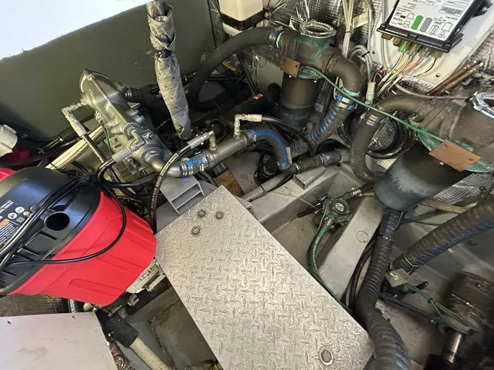 N'baluba Yacht Photos Pics Engine compartment of a 2008 Rivolta Coupe 4.5 with visible hoses and components.