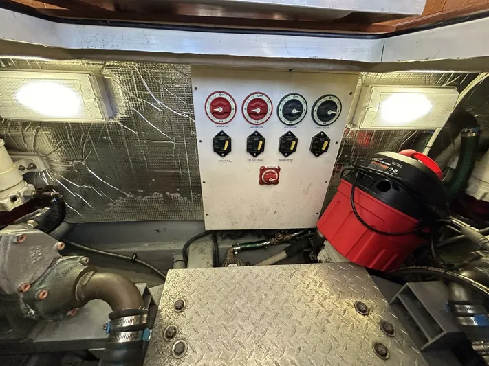 N'baluba Yacht Photos Pics Engine room of 2008 Rivolta Coupe 4.5 with control panel and mechanical components.