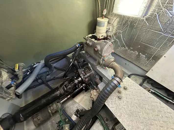 N'baluba Yacht Photos Pics Engine compartment of a 2008 Rivolta Coupe 4.5 with visible hoses and components.