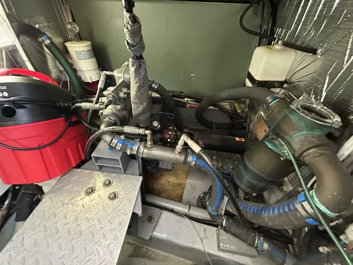 N'baluba Yacht Photos Pics Engine compartment of a 2008 Rivolta Coupe 4.5 with visible hoses and components.