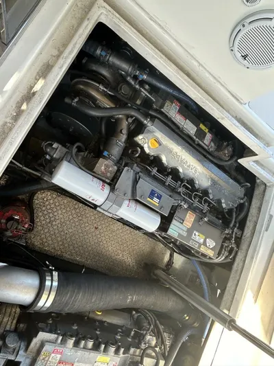 N'baluba Yacht Photos Pics Engine compartment of a 2008 Rivolta Coupe 4.5, showcasing mechanical components and wiring.