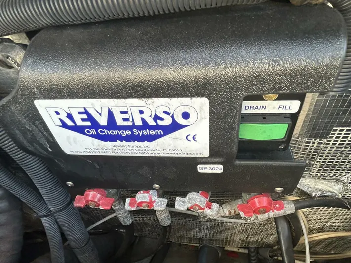 N'baluba Yacht Photos Pics Reverso oil change system in a 2008 Rivolta Coupe 4.5 engine compartment.