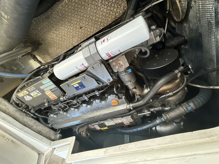 N'baluba Yacht Photos Pics Engine compartment of a 2008 Rivolta Coupe 4.5, showcasing intricate mechanical components.