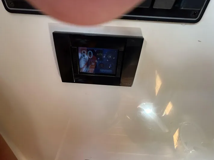 N'baluba Yacht Photos Pics 2008 Rivolta Coupe 4.5 dashboard display showing speedometer and controls.