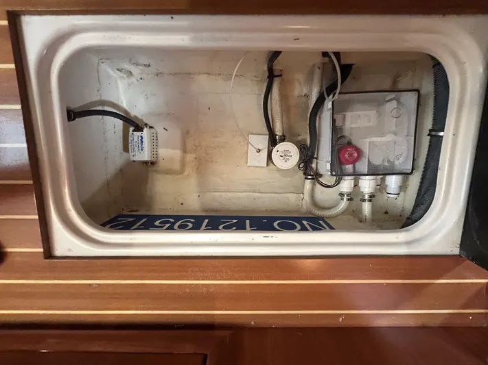 N'baluba Yacht Photos Pics 2008 Rivolta Coupe 4.5 interior compartment with wiring and components.