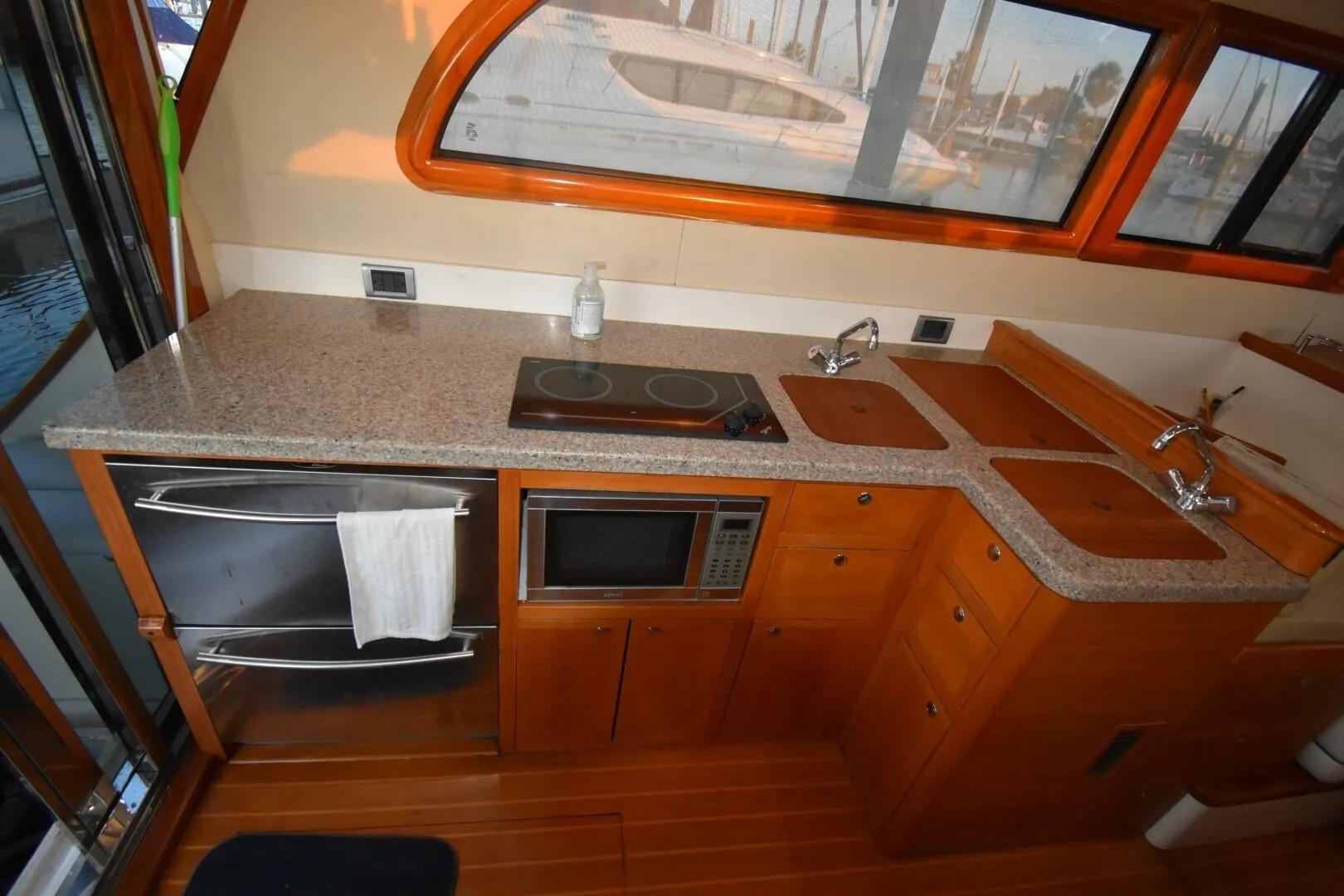 Luxurious kitchen interior of 2008 Rivolta Coupe 4.5 yacht with modern appliances.