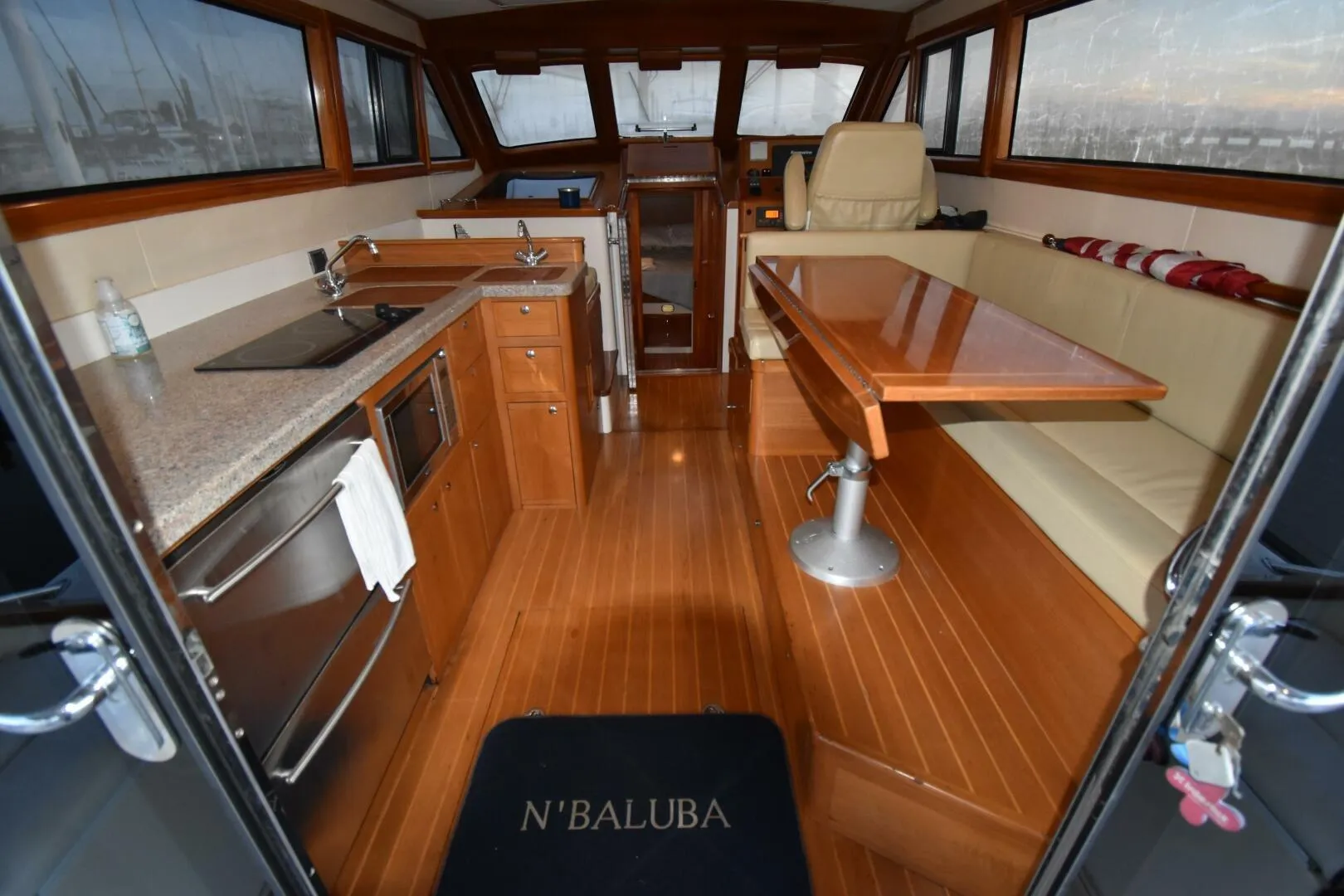 Interior of 2008 Rivolta Coupe 4.5 yacht with kitchen and seating area.