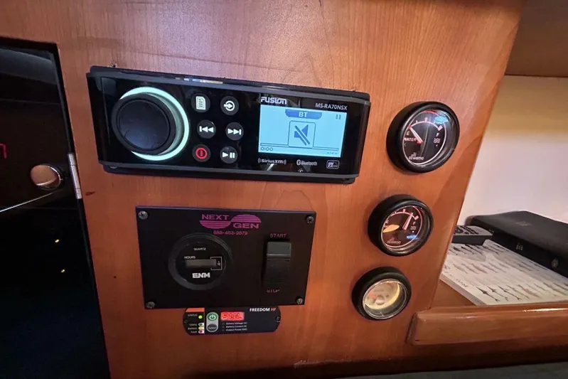 N'baluba Yacht Photos Pics 2008 Rivolta Coupe 4.5 dashboard with Fusion stereo and gauges.