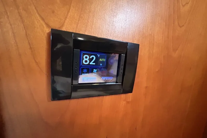 N'baluba Yacht Photos Pics Digital thermostat on wooden panel in a 2008 Rivolta Coupe 4.5.