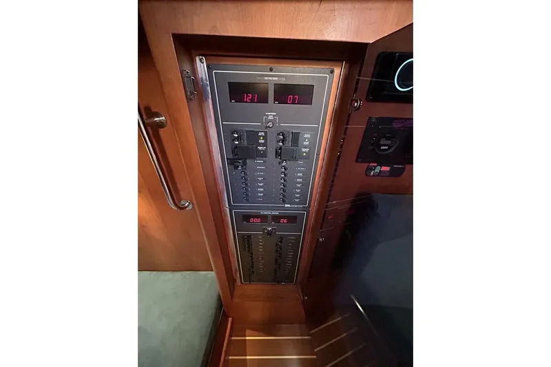 N'baluba Yacht Photos Pics Control panel inside 2008 Rivolta Coupe 4.5, featuring digital displays and switches.