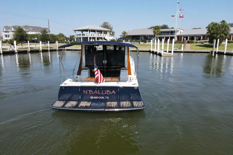 N'baluba Yacht Photos Pics 2008 Rivolta Coupe 4.5 boat docked in Seabrook, Texas marina.