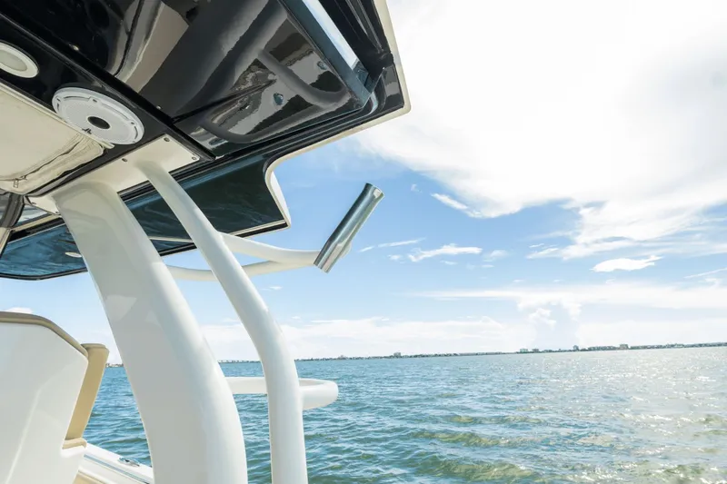 Pirates Bight Yacht Photos Pics 2019 Pursuit 408 boat detail with ocean view and clear sky.