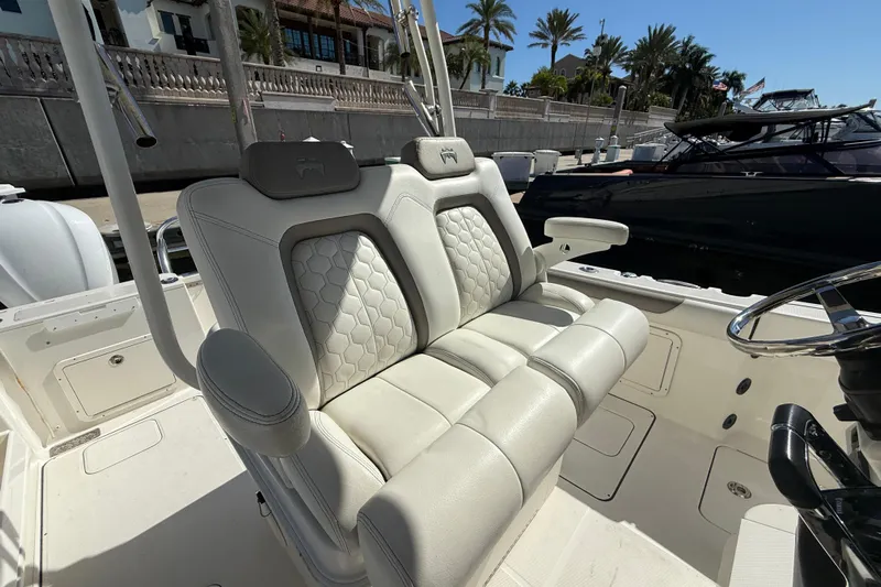  Yacht Photos Pics Luxurious seating on 2021 World Cat 295 CC boat, featuring elegant design and comfort.