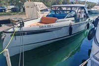 2022 Saxdor 320 GTO boat docked, featuring Twin Mercury 300 V8 engines.
