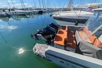 2022 Saxdor 320 GTO with Twin Mercury 300 V8 engines docked in marina.