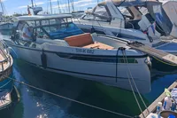 2022 Saxdor 320 GTO boat docked, featuring Twin Mercury 300 V8 engines.