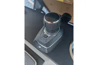 Control knob on 2022 Saxdor 320 GTO boat dashboard, featuring advanced navigation controls.