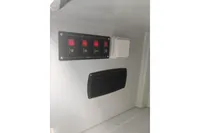 Control panel of 2022 Saxdor 320 GTO boat with switches and vent.