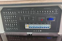 Control panel of a 2022 Saxdor 320 GTO boat, featuring various switches and voltage display.