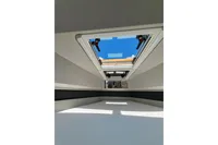 Interior view of Saxdor 320 GTO 2022, featuring a skylight and modern design elements.