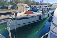 2023 Saxdor 320 GTO boat docked, featuring Twin Mercury 300 V8 engines.