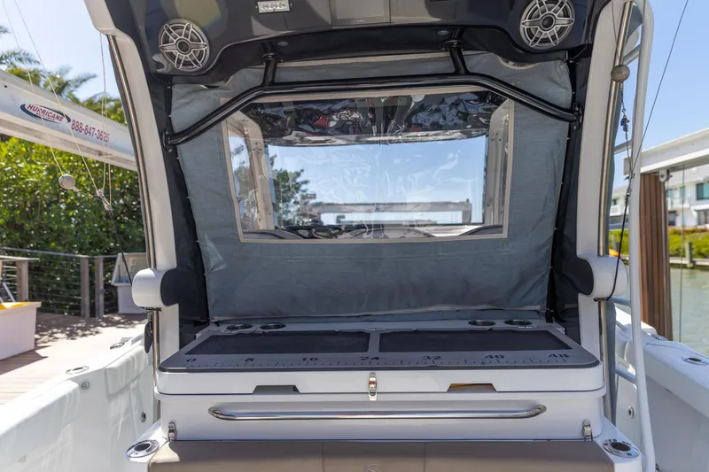  Yacht Photos Pics 2023 Edgewater 370CC boat interior with seating and storage area.