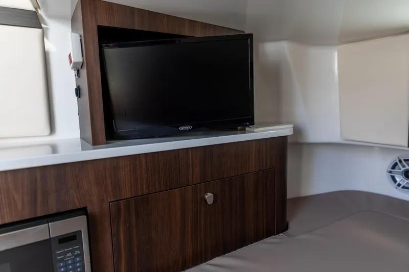  Yacht Photos Pics Interior of 2023 Edgewater 370CC boat with TV and microwave.