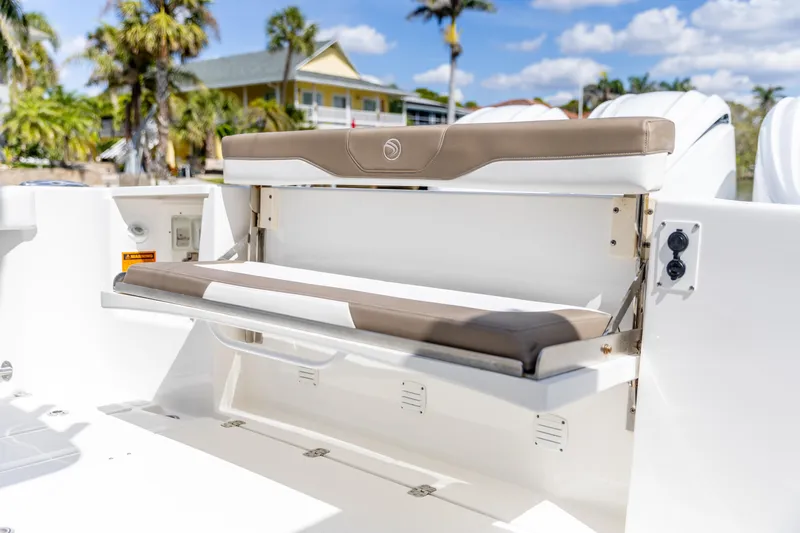  Yacht Photos Pics 2023 Edgewater 370CC boat with foldable seating, tropical background.