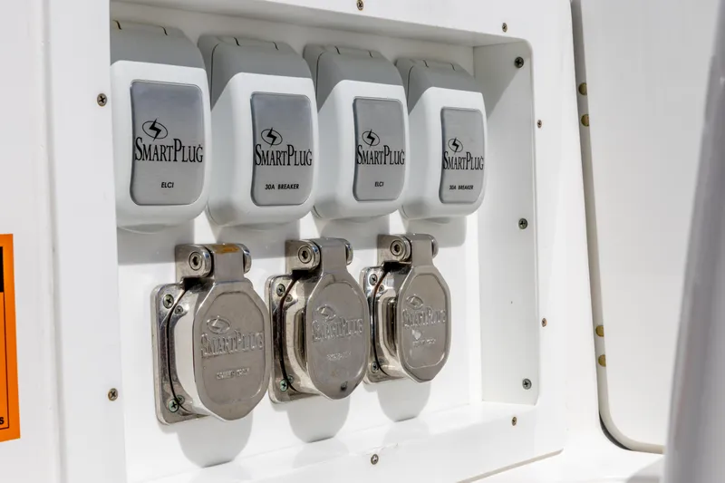  Yacht Photos Pics Edgewater 370CC 2023 SmartPlug electrical panel with multiple outlets.