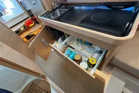 Modern kitchen in 2023 Nimbus C11 boat with sleek design and ample storage.