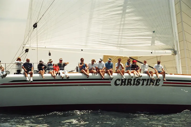 Christine Yacht Photos Pics Group of people sitting on a 1996 Custom 100' Sailing Yacht named "Christine."