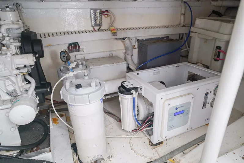 Smoker II Yacht Photos Pics Engine room of a 2007 Bertram 510 Convertible yacht, showcasing machinery and equipment.