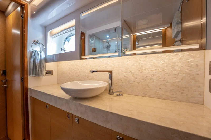 Mystic Soul Yacht Photos Pics Luxurious bathroom in 2019 Horizon PC52 yacht with modern sink and elegant design.