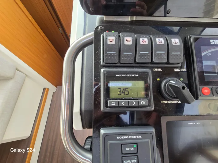 Latitude Adjustment Yacht Photos Pics Control panel of a 2022 Greenline 39 Hybrid boat, featuring Volvo Penta display.