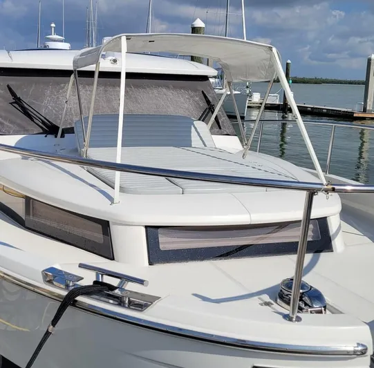 Latitude Adjustment Yacht Photos Pics 2022 Greenline 39 Hybrid yacht docked, featuring sleek design and modern amenities.