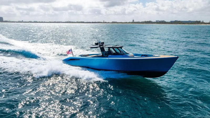 Elizabeth Yacht Photos Pics 2022 Wajer 55 S yacht cruising on open sea with American flag.