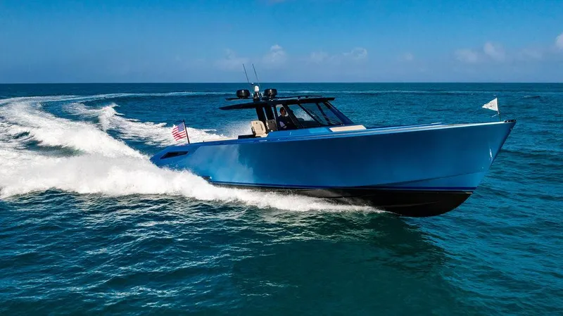 Elizabeth Yacht Photos Pics 2022 Wajer 55 S luxury yacht cruising on open sea under clear blue sky.