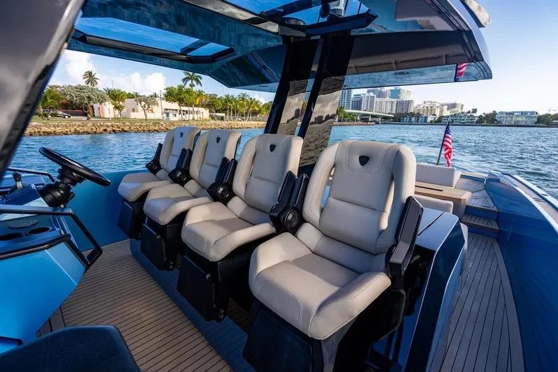 Elizabeth Yacht Photos Pics Luxury seating on 2022 Wajer 55 S yacht, featuring sleek design and waterfront view.