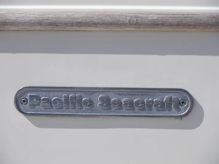 Tapawingo Yacht Photos Pics Pacific Seacraft 40, 1998 model nameplate on boat exterior.