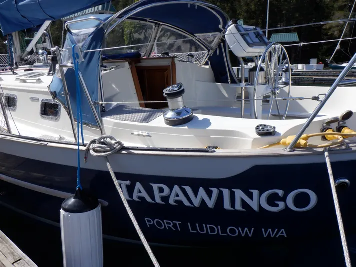 Tapawingo Yacht Photos Pics 1998 Pacific Seacraft 40 sailboat docked, named "Tapawingo," Port Ludlow, WA.