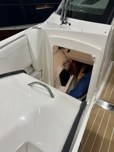 Tinkers Toye Yacht Photos Pics 2024 Tiara Yachts 34 LX interior cabin view with sleek white design.