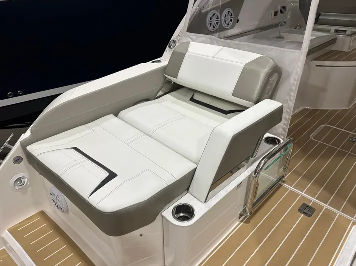 Tinkers Toye Yacht Photos Pics 2024 Tiara Yachts 34 LX luxury seating with beige and white upholstery on deck.