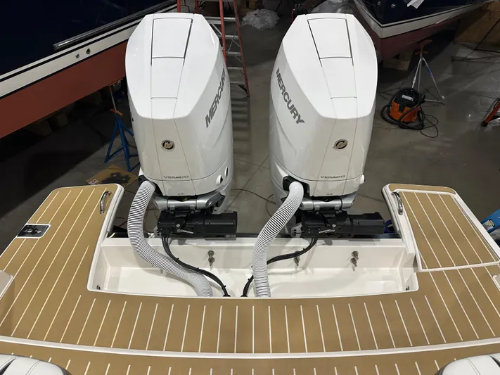 Tinkers Toye Yacht Photos Pics 2024 Tiara Yachts 34 LX with dual Mercury outboard engines on teak deck.