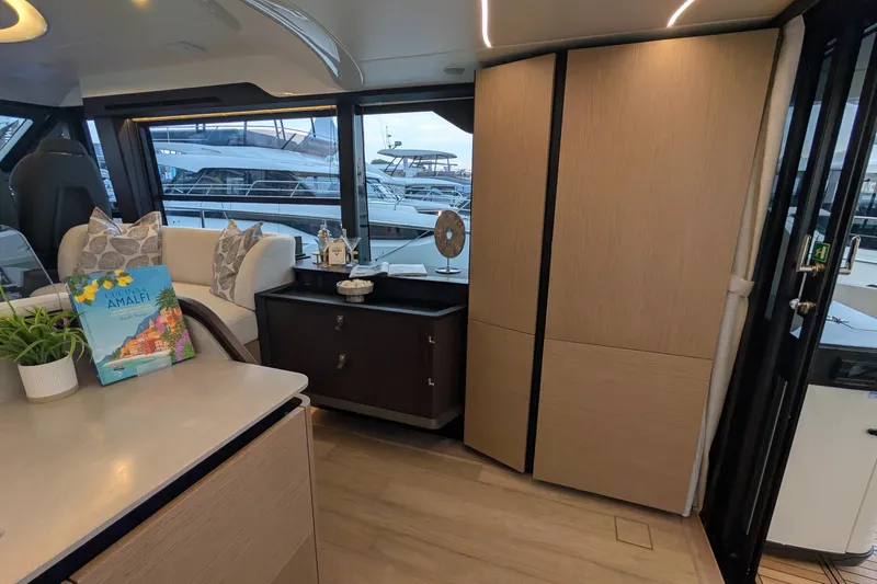  Yacht Photos Pics Luxurious interior of 2025 Absolute 52 FLY yacht with modern furnishings and decor.