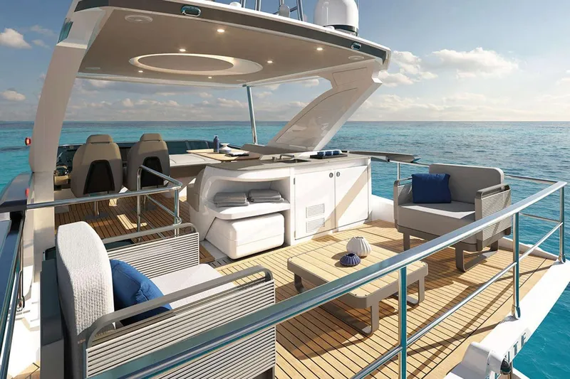  Yacht Photos Pics Luxurious 2025 Absolute 52 FLY yacht with elegant deck and ocean view.