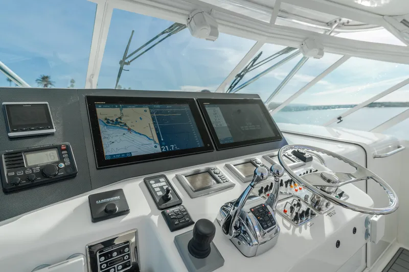 Apothecary Yacht Photos Pics Cabo Express 2011 yacht helm with navigation screens and controls.