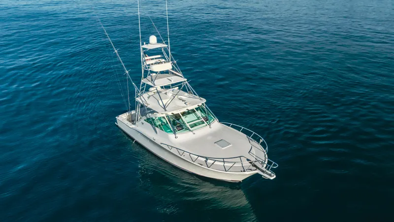 Apothecary Yacht Photos Pics 2011 Cabo Express boat on calm ocean waters, aerial view.