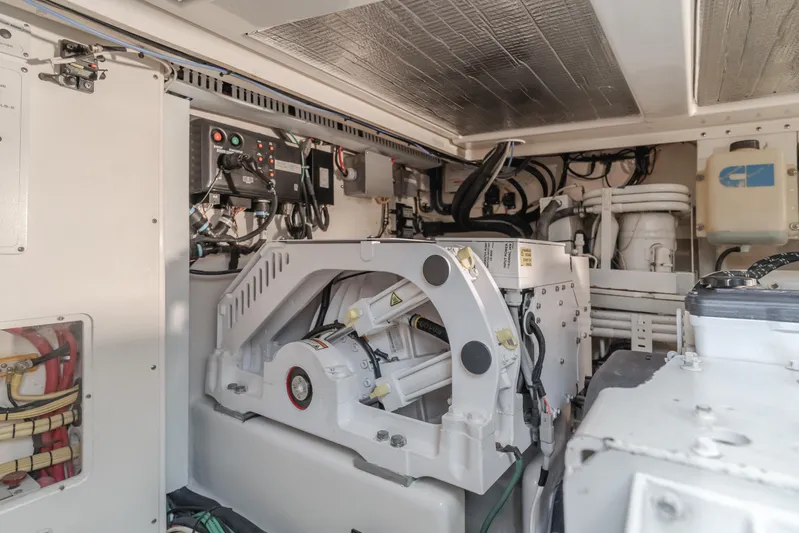 Apothecary Yacht Photos Pics Engine room of 2011 Cabo Express boat with mechanical components and wiring.