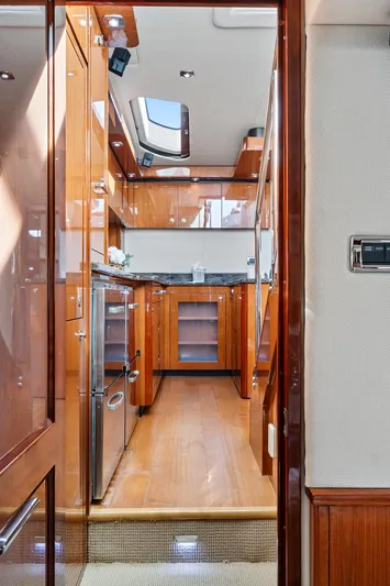 Majestic Stars Yacht Photos Pics Luxurious 2012 Sea Ray Sundancer 580 yacht interior with modern kitchen and wood finishes.