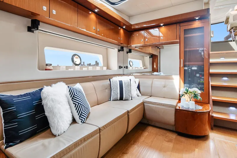 Majestic Stars Yacht Photos Pics Luxurious interior of 2012 Sea Ray Sundancer 580 yacht with elegant seating and decor.